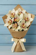 Букет 7 белых орхидей в Междуреченске Букет цветов из:  Орхидеи и Розы в Междуреченске